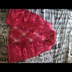 Pink puffer sleeveless coat